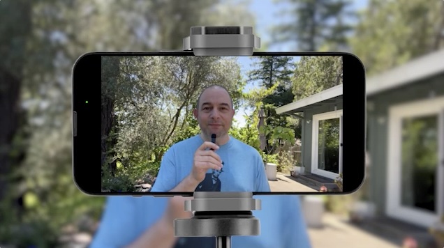 Teacher recording a losson on a phone